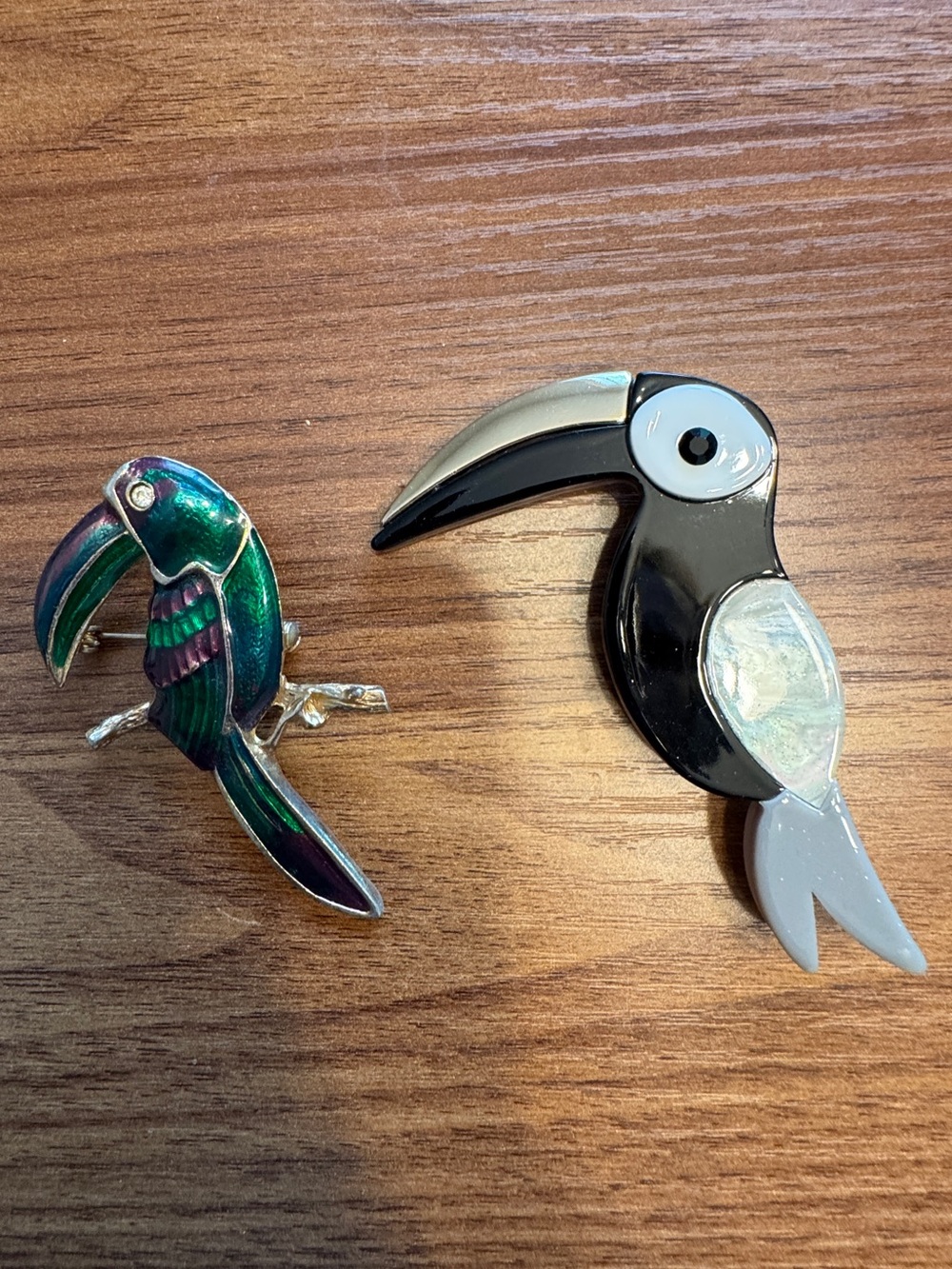 2 exotic bird brooches